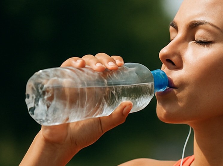 Sporter met drinkfles